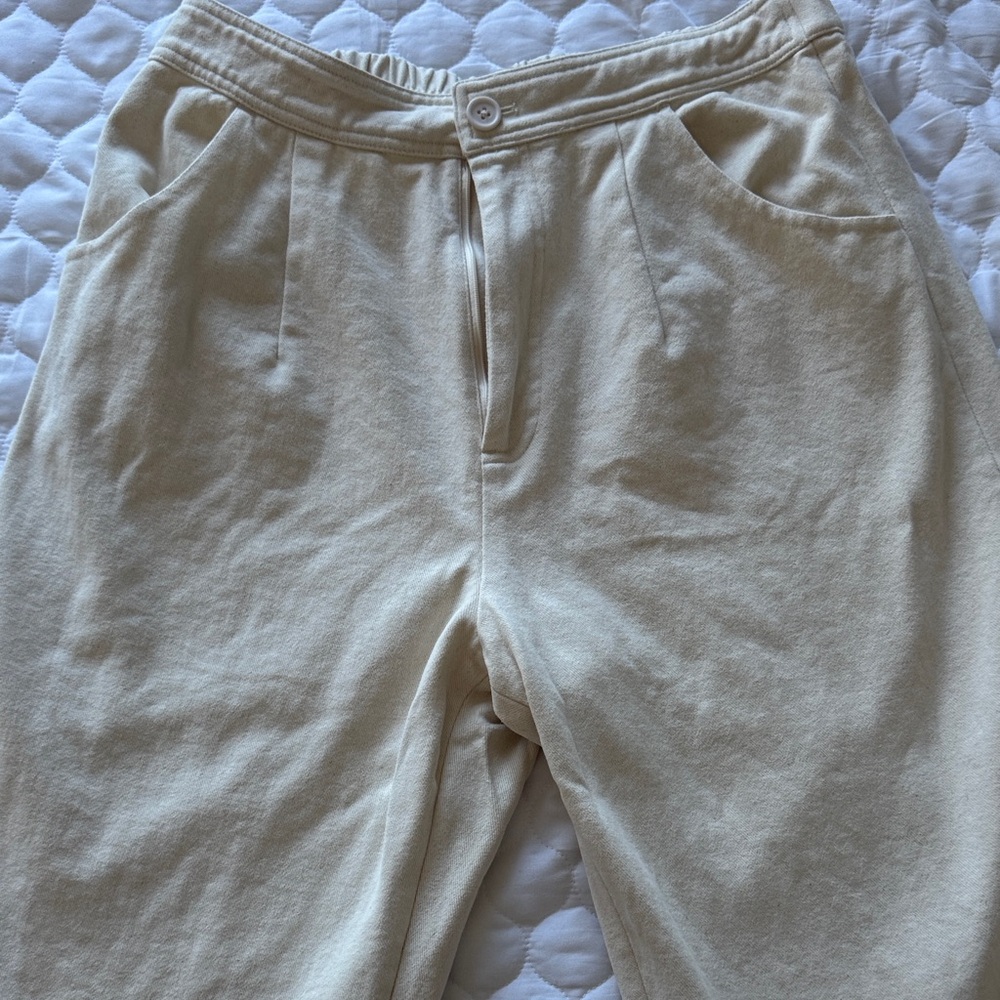 7115 by Szeki cream ankle length pants. Warm and cozy!